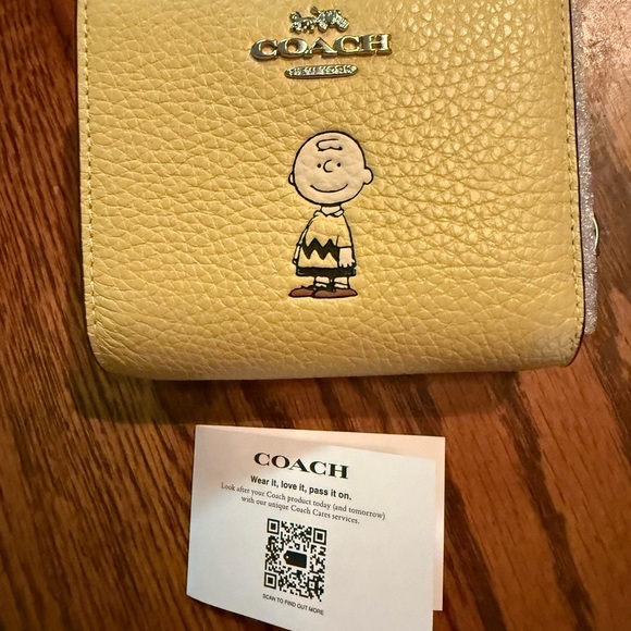 NWT Coach x Peanuts Snap Wallet featuring Charlie Brown - Picture 2 of 9